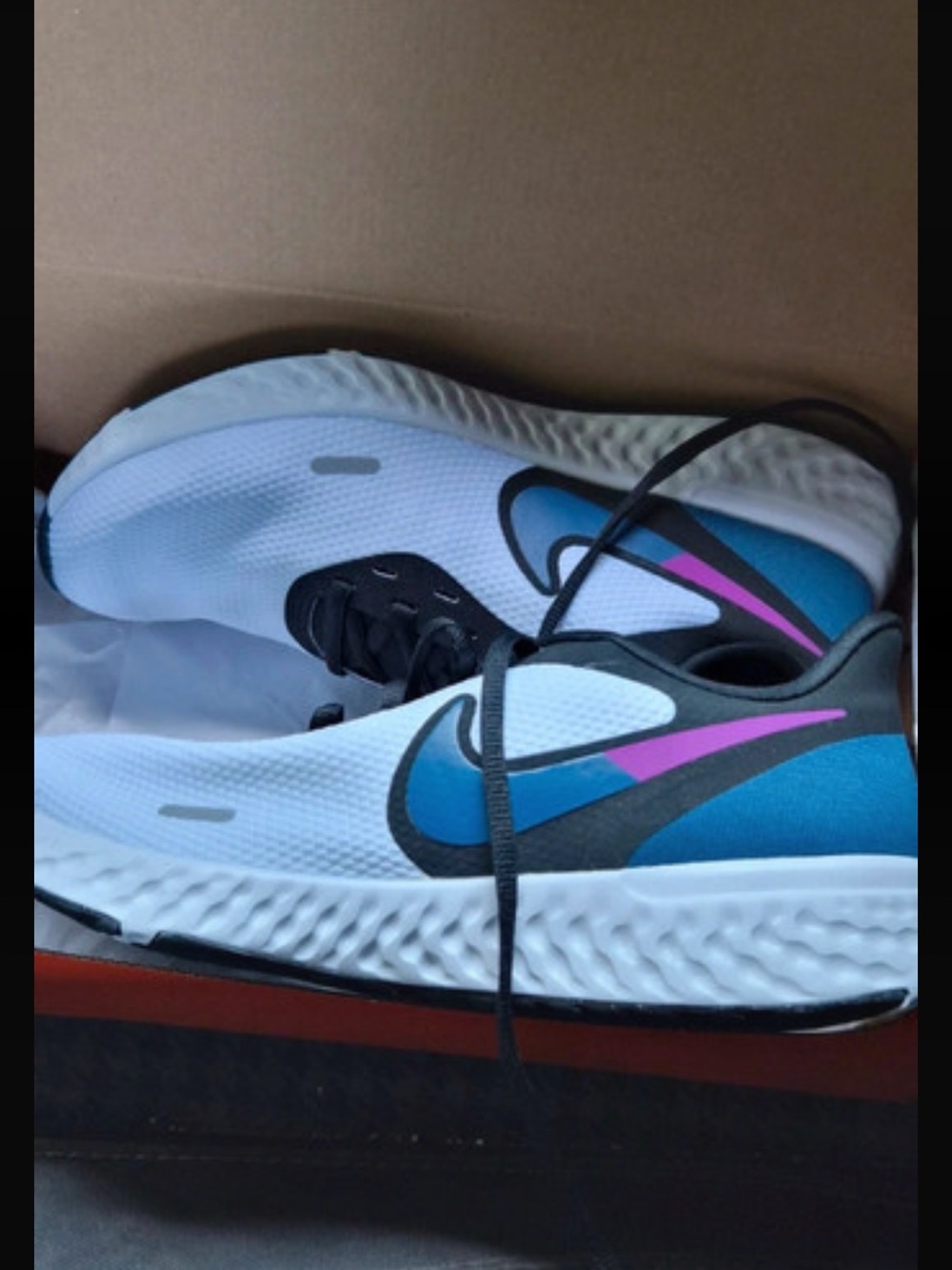 Nike White Running Shoes with Blue & Purple Accents